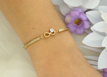 Złota bransoletka Nomination Italy Milleluci z symbolem nieskończoności i sercem z kryształka. Stal szlachetna, cyrkonie, regulowana długość 14–19 cm. Idealna na prezent! (3).jpg